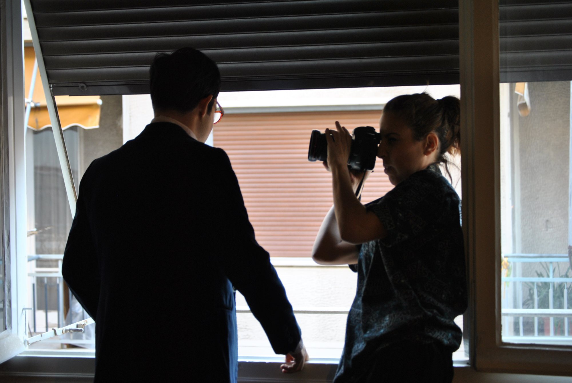 Behind the scenes: photographing the performer at the window for the campaign image