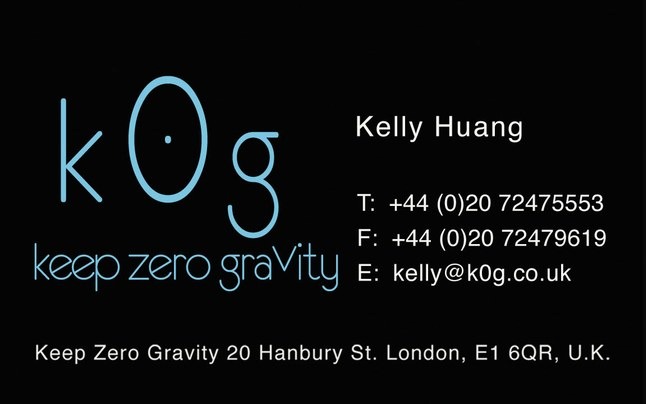 Black business card with the k0g logo in blue