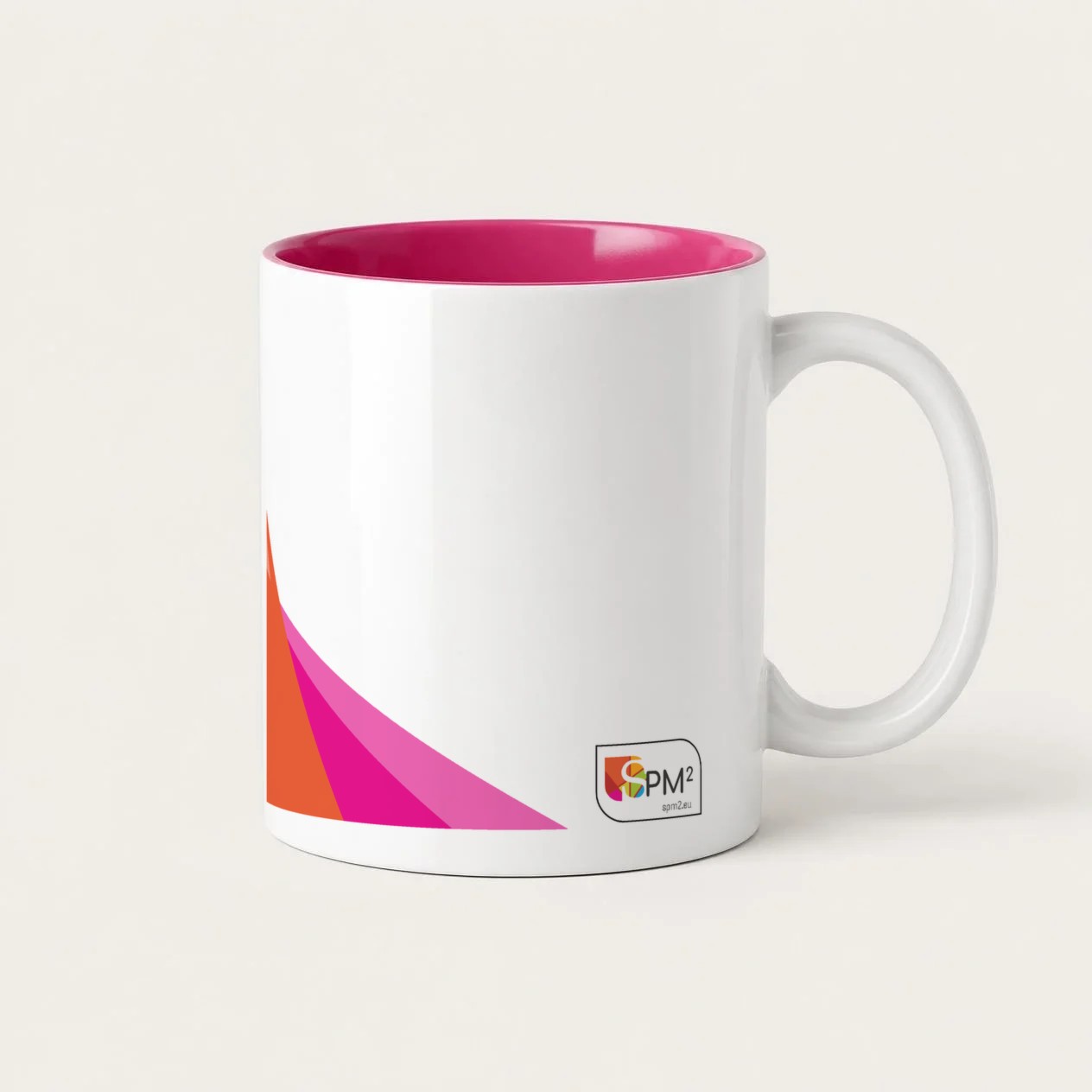 Concept: a white mug with a pink inside and the SPM² logo