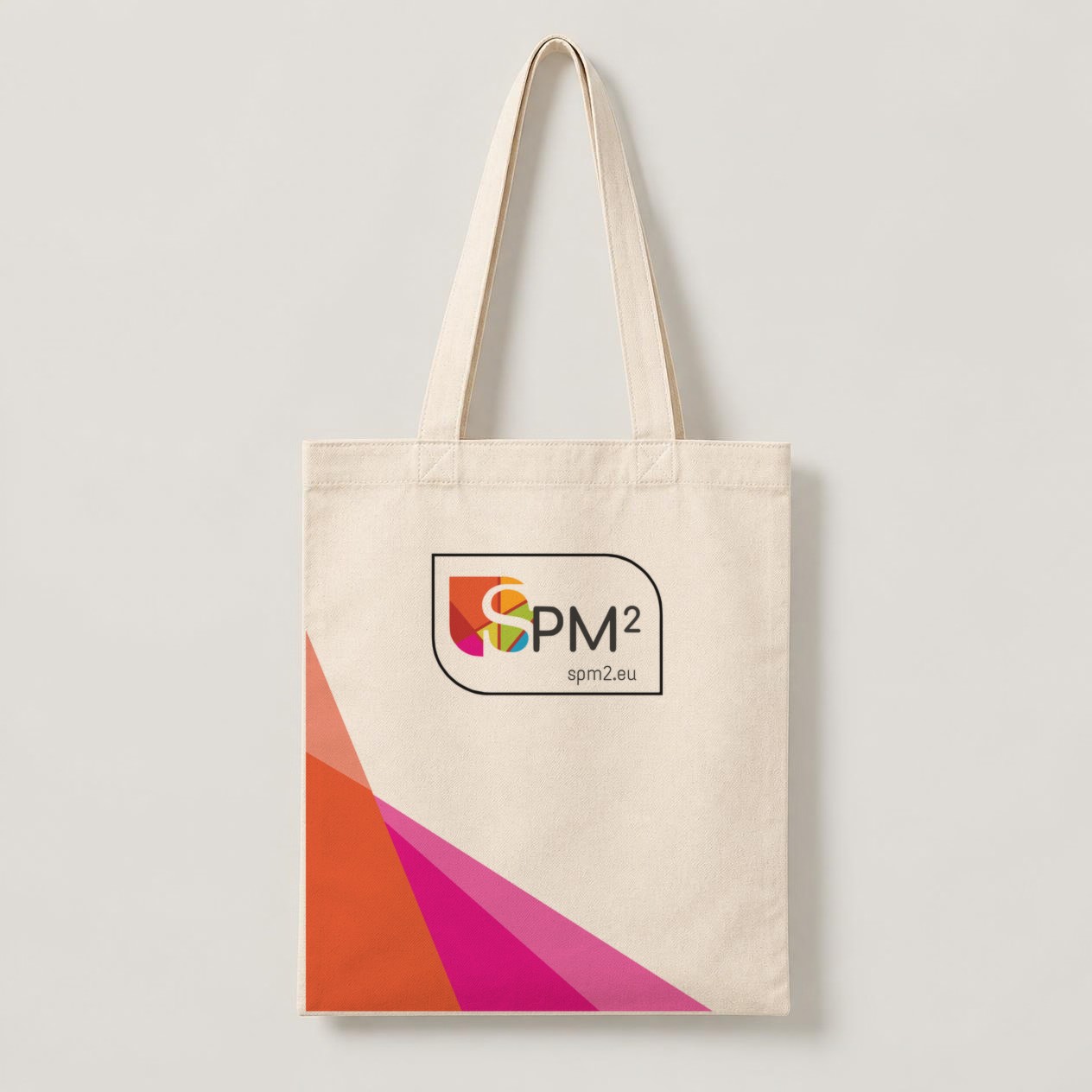 Concept: a cotton tote bag with the SPM² logo and pink and orange shapes