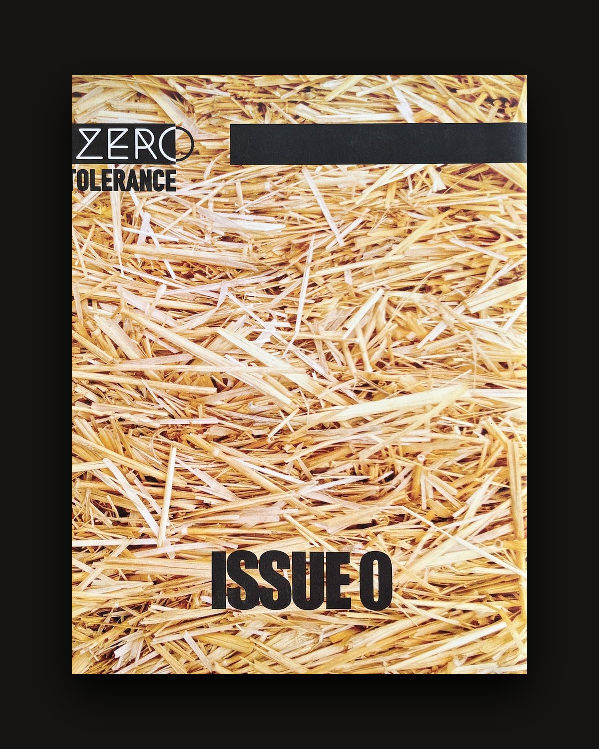 The back cover: the same straw field with 'Issue 0'